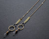 stylish glasses chain, gold and black with metal leaves, handmade Nea Jewelry